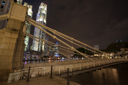 SINGAPORE - NOVEMBER 07, 2012  Pedestrian Cavenagh Bridge is the only suspension bridge,it is the oldest bridge in Singapore,in lower reaches of the Singapore River in the Downtown  Opened in 1869 のeditorial素材