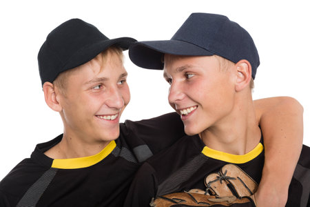 Close-up portrait of brothers twins baseball players