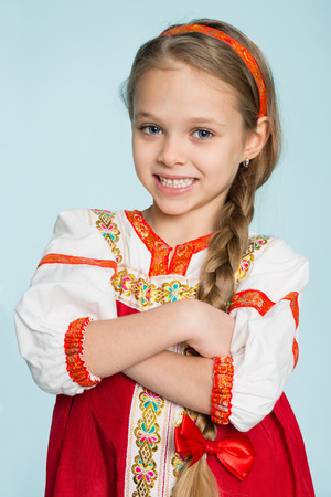 Little girl in traditional Russian folk costume. Girl seven years.の写真素材