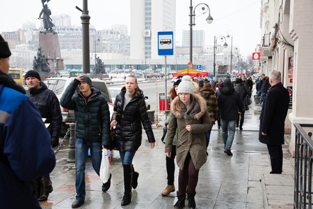 VLADIVOSTOK, RUSSIA - MARCH 8, 2015: Residents and visitors on the street Svetlanskaya - is the main street in Vladivostok. The population of Vladivostok is about 600,000 people.のeditorial素材