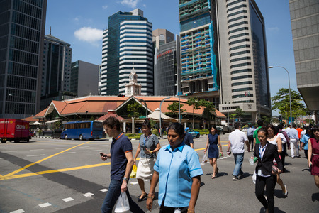 SINGAPORE - FEBRUARY 18, 2015: Singapore's Central Business District (CBD), the intersection Raffles Quay and Central Boulevard. The business district is a symbol of dynamic Singapore.のeditorial素材