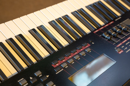 Electronic musical keyboard synthesizer close-upの写真素材