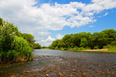 River summer landscape with blue sky and clouds. Far East, Russia.の写真素材