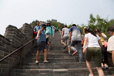 BEIJING - CIRCA JUNE, 2015: Many tourists up and down the steps of the Great Wall of China. Great Wall of China It passes through China, is the longest man-made structure in the world.のeditorial素材
