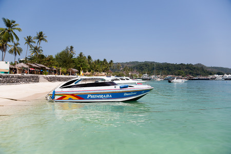 PHI PHI ISLANDS, THAILAND - CIRCA FEBRUARY, 2015: Speed boats on the shore of the island of Phi Phi Doh in the Andaman Sea. Island is very popular with tourists from all over the worldのeditorial素材
