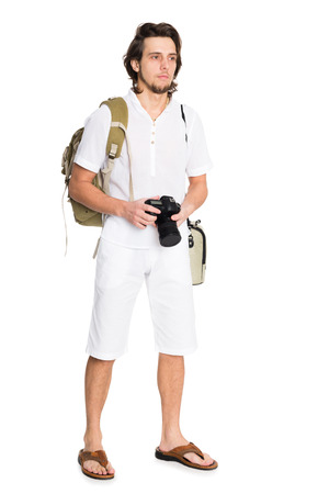 Young man in a summer suit with the camera. Isolated on white.の写真素材
