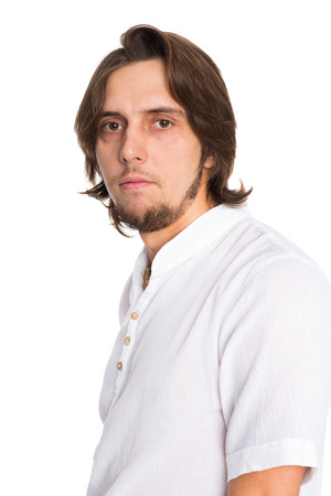 Portrait of a young handsome man. Isolated on white.の写真素材
