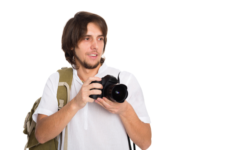 Handsome photographer with camera in beach suit. Isolated on white.の写真素材