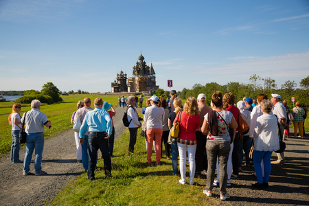 ISLAND OF KIZHI, RUSSIA - CIRCA JUNE: Tourists visiting the historical sights on the famous island of Kizhi in Karelia in the north of Russia.のeditorial素材