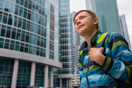 Portrait of a teenager on a background Moscow International Business Center の写真素材