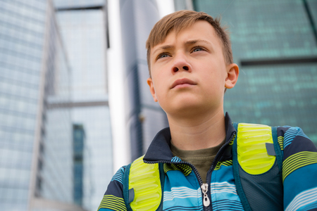 Portrait of a teenager on a background Moscow International Business Center の写真素材