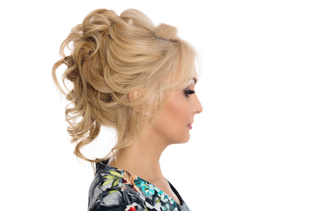 Girl blonde hairstyle model shows in profileの写真素材