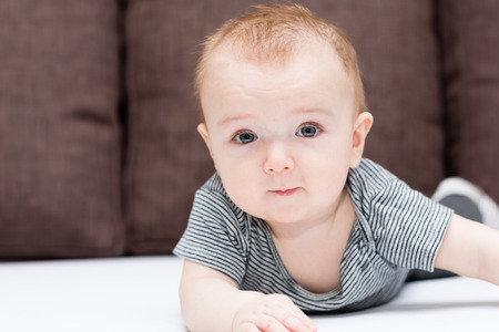 Portrait of a little cute boy of six monthsの写真素材