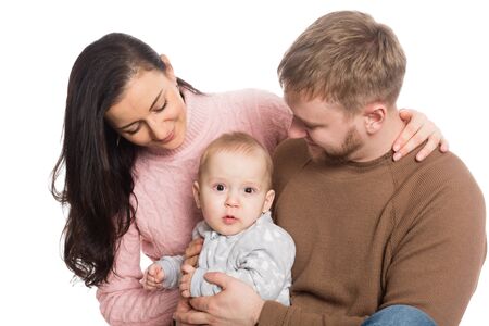 Happy family father mother and little boy. Isolation on white.の写真素材