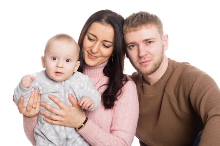 Young family father mother and little boy. Isolation on white.の写真素材