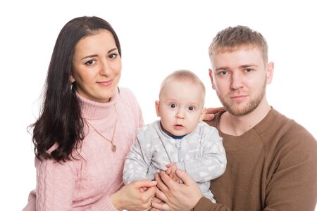 Young family father mother and little boy. Isolation on white.の写真素材