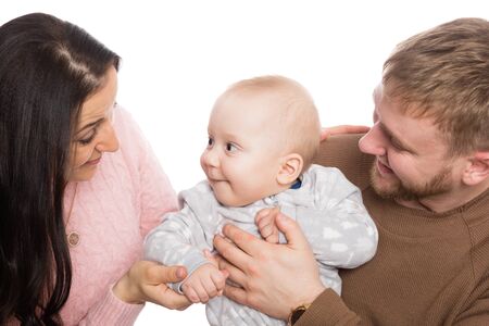 Young family father mother and little boy son. Isolation on white.の写真素材
