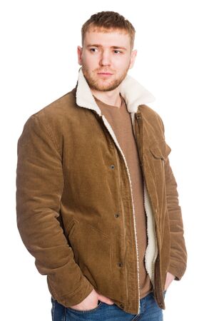Portrait young European man in a winter jacket. Isolated on white.の写真素材