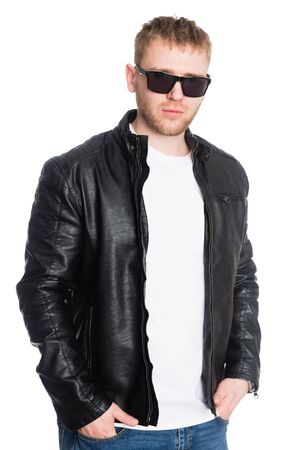 Young European man with a beard in sunglasses. Isolated on a white.の写真素材