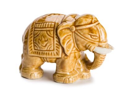 Porcelain miniature elephant sculpture isolated on white.の写真素材