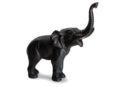 Cast iron elephant miniature sculpture isolated on white.の写真素材