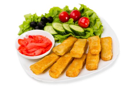 Grilled fish fingers with vegetables. Isolated on white.の写真素材