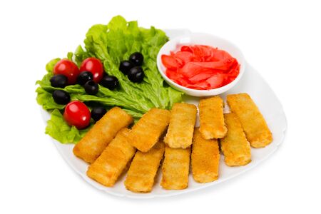 Fried fish sticks with vegetables. Isolated on white.の写真素材