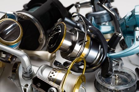 Fishing reels new and oldの写真素材