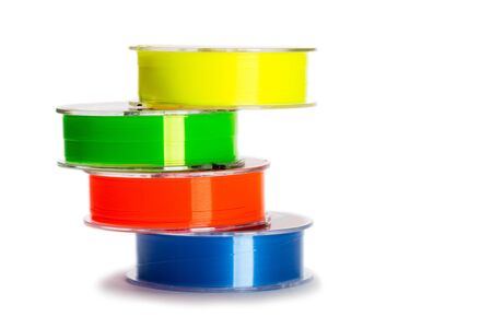 Multi-colored monofilament fishing line for fishing isolated on whiteの写真素材