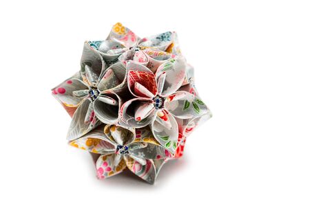 Origami Japan traditiona art in the shape of a paper ball - Kusudama isolated on whiteの写真素材