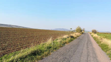Long straight road with a view of Mikulov. Cycle route to Mikulov in the Czech Republic.の写真素材