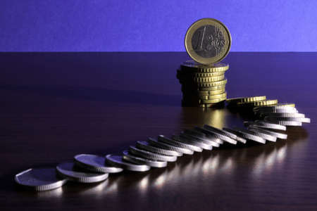 The road to the euro. Row of small coins.