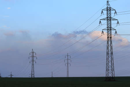 High voltage pylons. High voltage power lines. Electrical distribution network. Infrastructure.