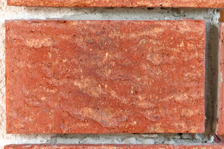 Detail of decorative building brick in the wall.