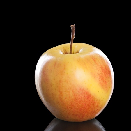 fresh red apple over black backgroundの写真素材