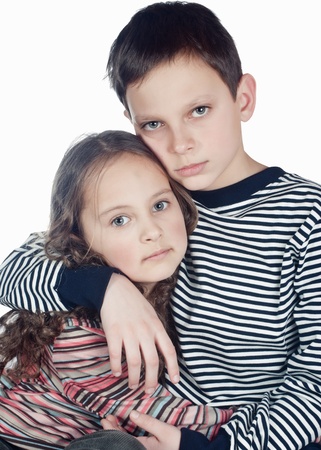 close up portrait of brother and sister over white backgroundの写真素材