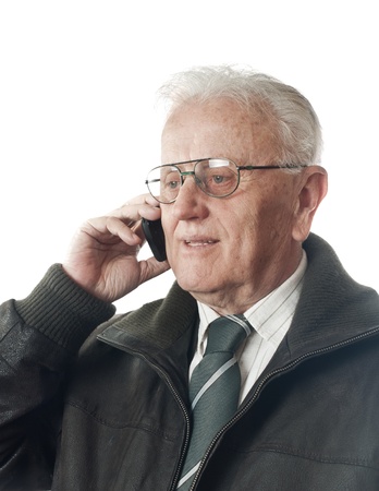 Senior businessman with phone  portrait over white backgroundの写真素材