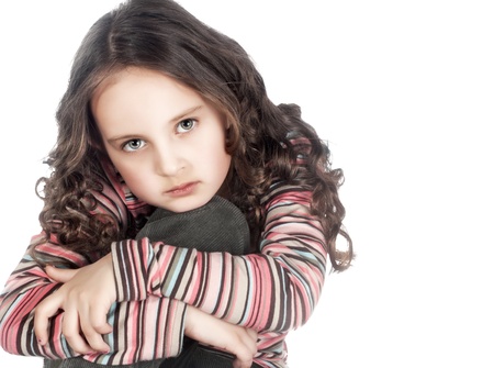 Close up photo of beautiful little girl with long hairの写真素材