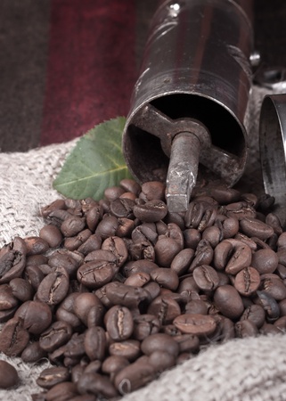 coffee grinderon coffee beans close upの写真素材