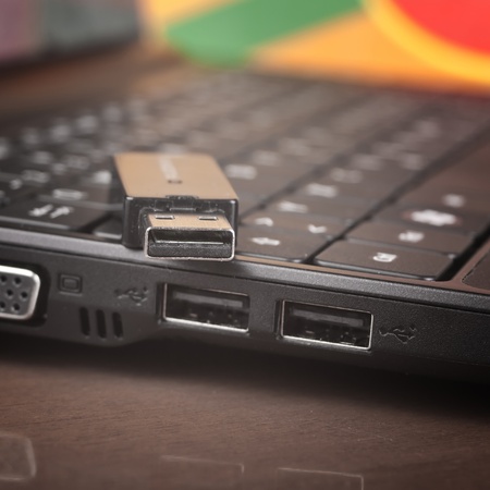 USB memory drive on netbookの写真素材