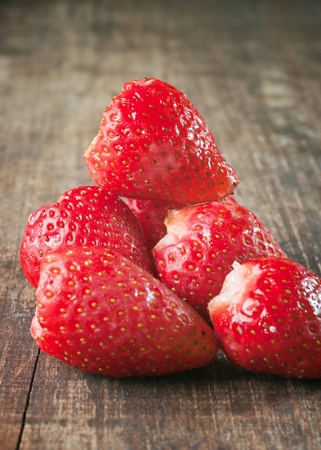 photo of delicious strawberries on wooden tableの写真素材