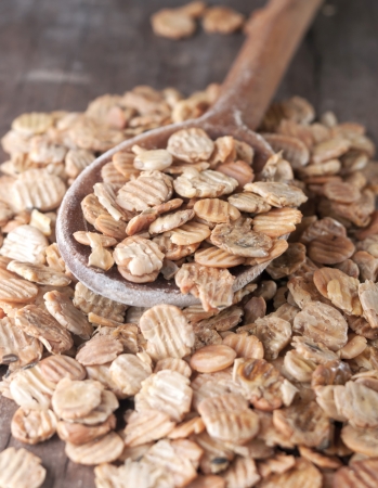 Soy flakes, meat alternative food ingredient in wooden spoonの写真素材