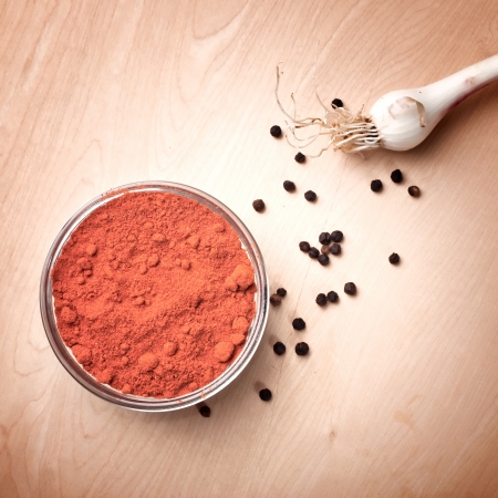 close up of ground paprika in the glass dishの写真素材