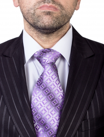 Closeup portrait of businessman in white collar shirt and suit with tie.の写真素材