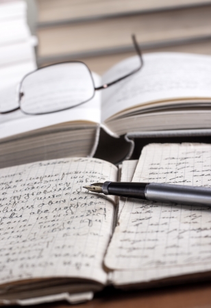 books and volumes on the table,shallow depth of fieldの写真素材