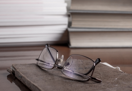 books and volumes on the table,shallow depth of field