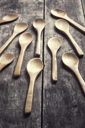 Wooden spoon lying on a table.の写真素材