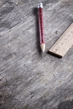 wooden ruler and pen  on wooden tableの写真素材
