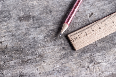 wooden ruler and pen  on wooden tableの写真素材