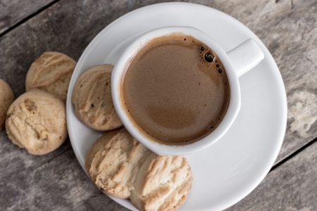cookies and cup of coffee on tableの写真素材